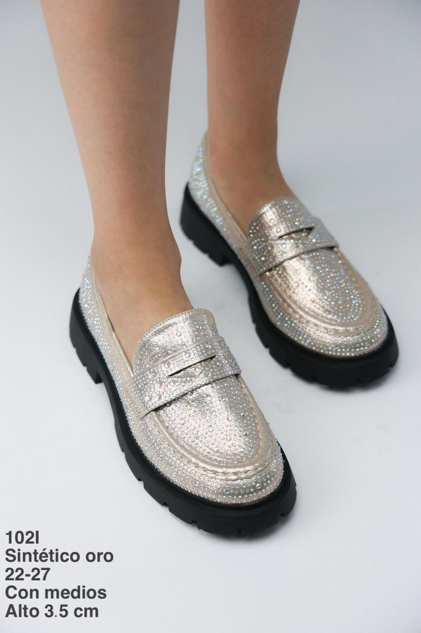 102I Sintético Oro